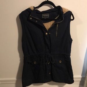 Navy fur lined zip vest.